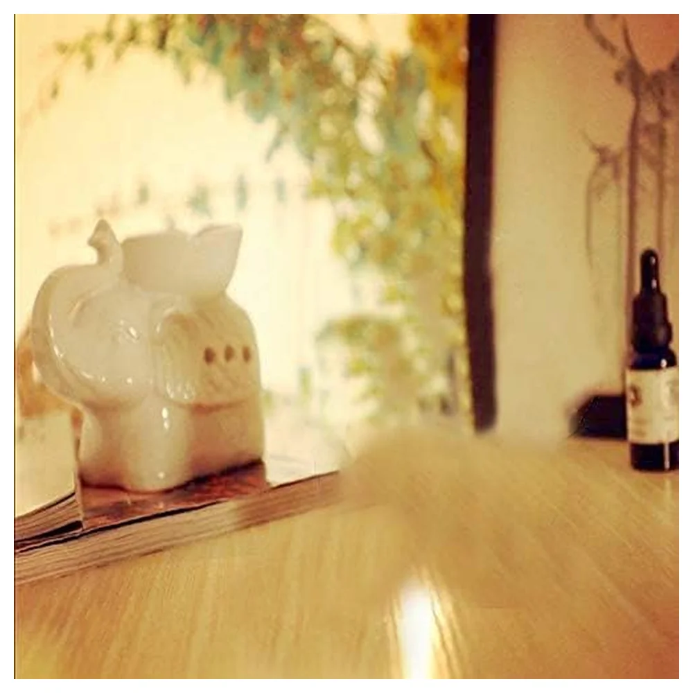 GulfDealz White Ceramic Elephant Aroma Oil Burner with Lotus Bowl, Decorative Tealight Fragrance Diffuser for Living Room, Bedroom and Patio - Image 7